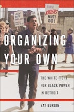 Organizing Your Own A Civil Rights-era photo of a man marching alongside people holding protest signs.